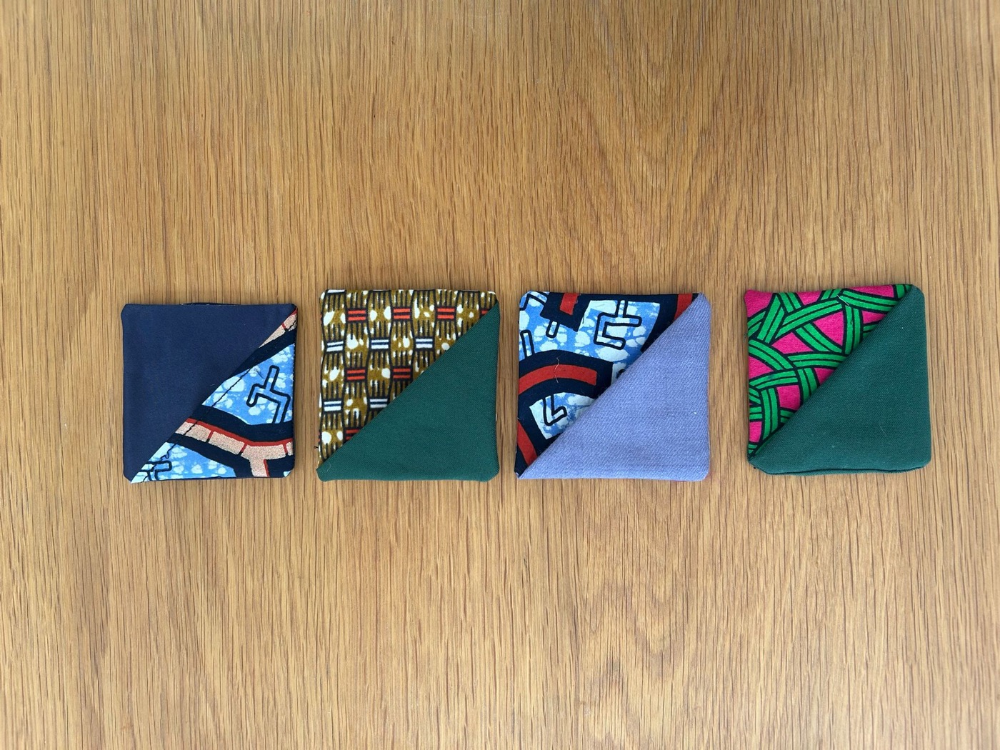 Four handcrafted corner bookmarks in a row