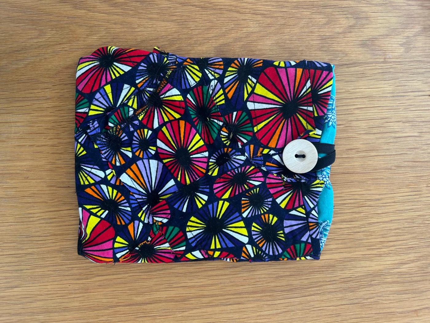 Multicolour Kindle case with vibrant fabric pattern