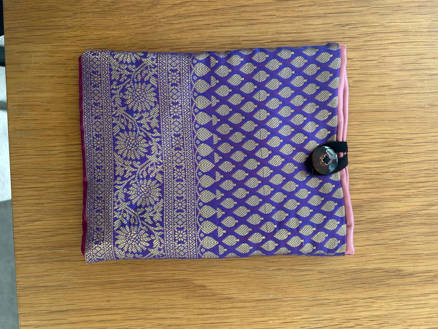 Purple and gold sari-fabric Kindle case with button closure